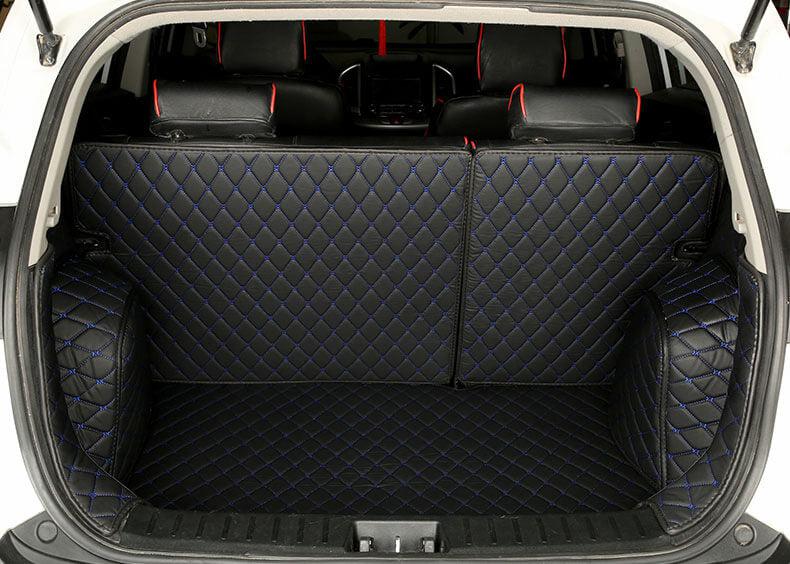 https://www.carmatscustoms.com/cdn/shop/products/black-blue-full-custom-trunk-mats.jpg?v=1677483037