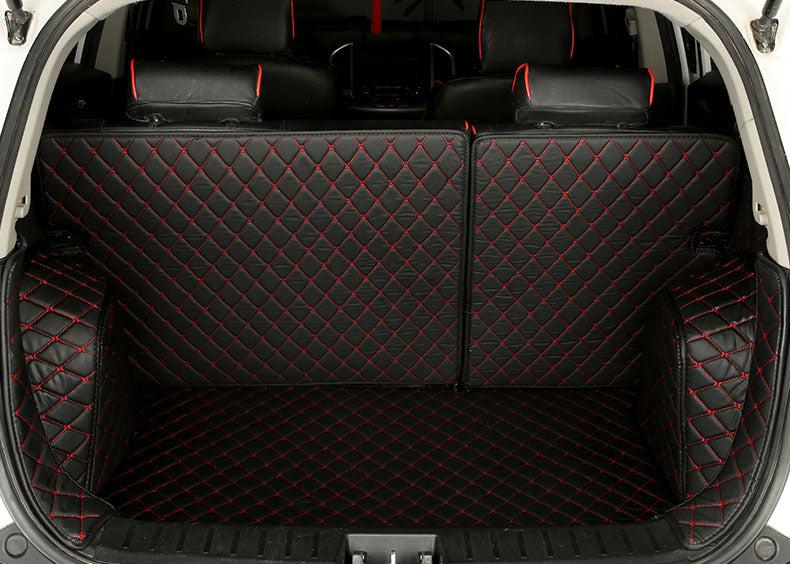 https://www.carmatscustoms.com/cdn/shop/products/black-red-full-custom-trunk-mats.jpg?v=1677483049